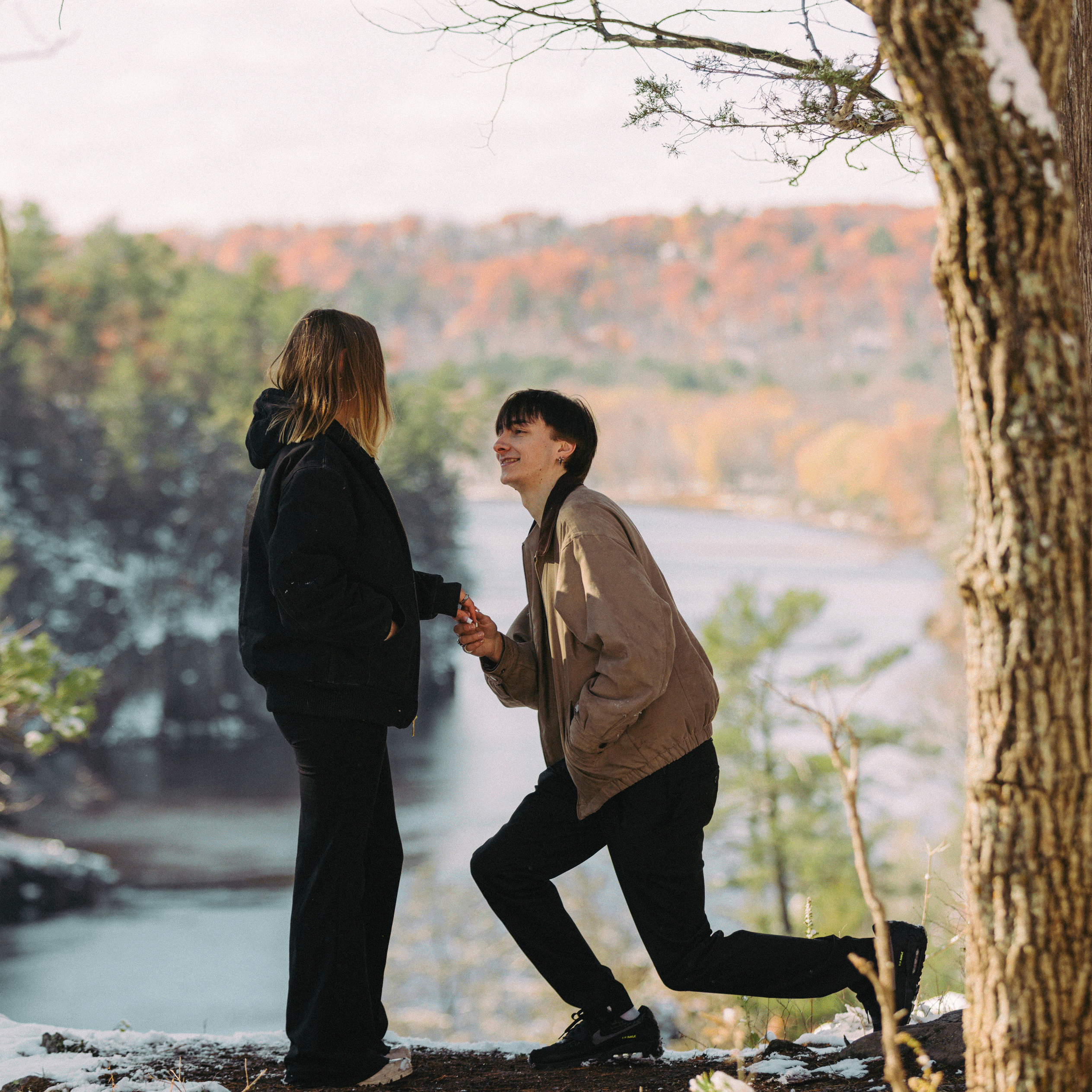 taylors falls snowy fall surprise proposal getting down on one knee documentary candid brianna kirk photography gif