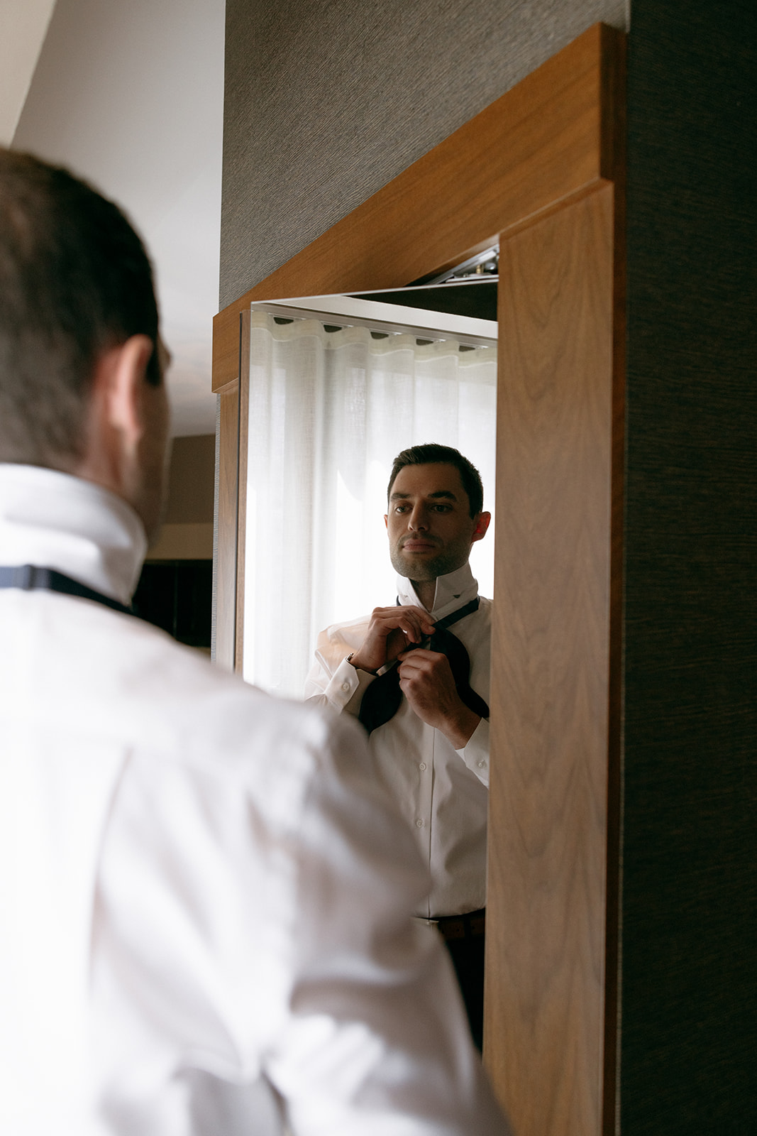 A groom gets ready for his wedding day at The Roxy