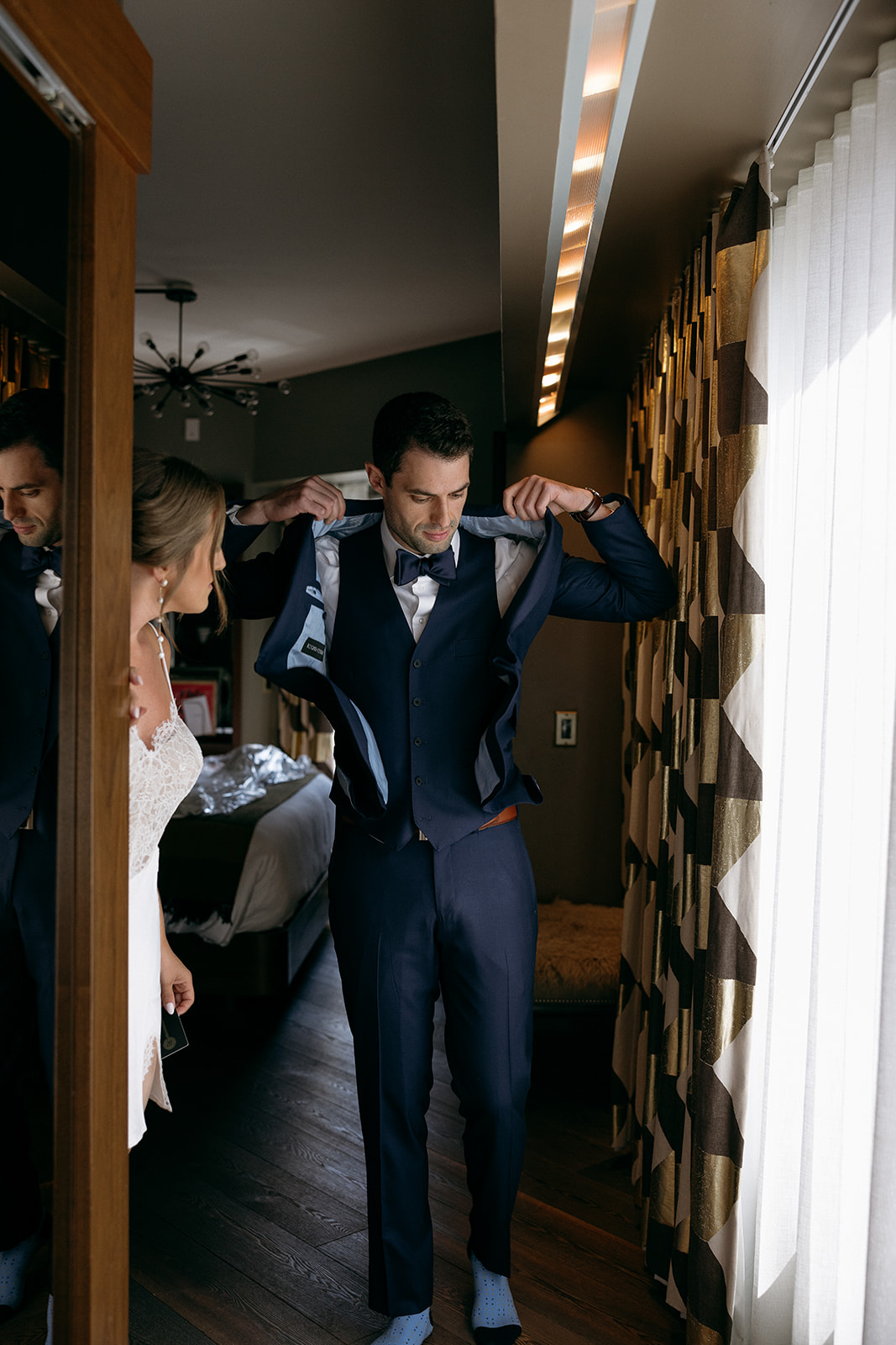 A bride and groom gets ready for his wedding day at The Roxy