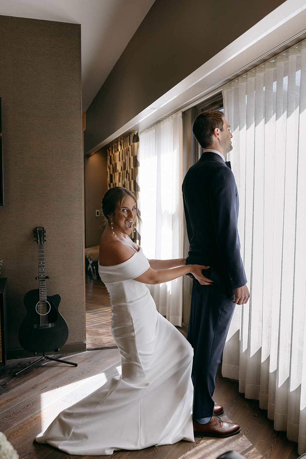A bride and groom have their first look at The Roxy Hotel