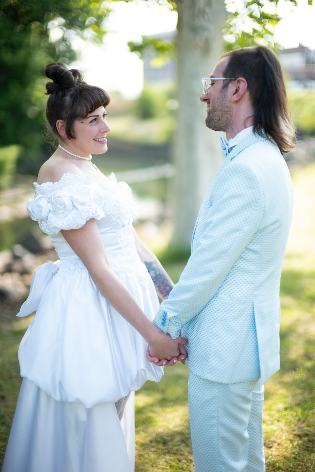Authentic, candid moment of emotion between bride and groom during their relaxed wedding photo session in Scranton