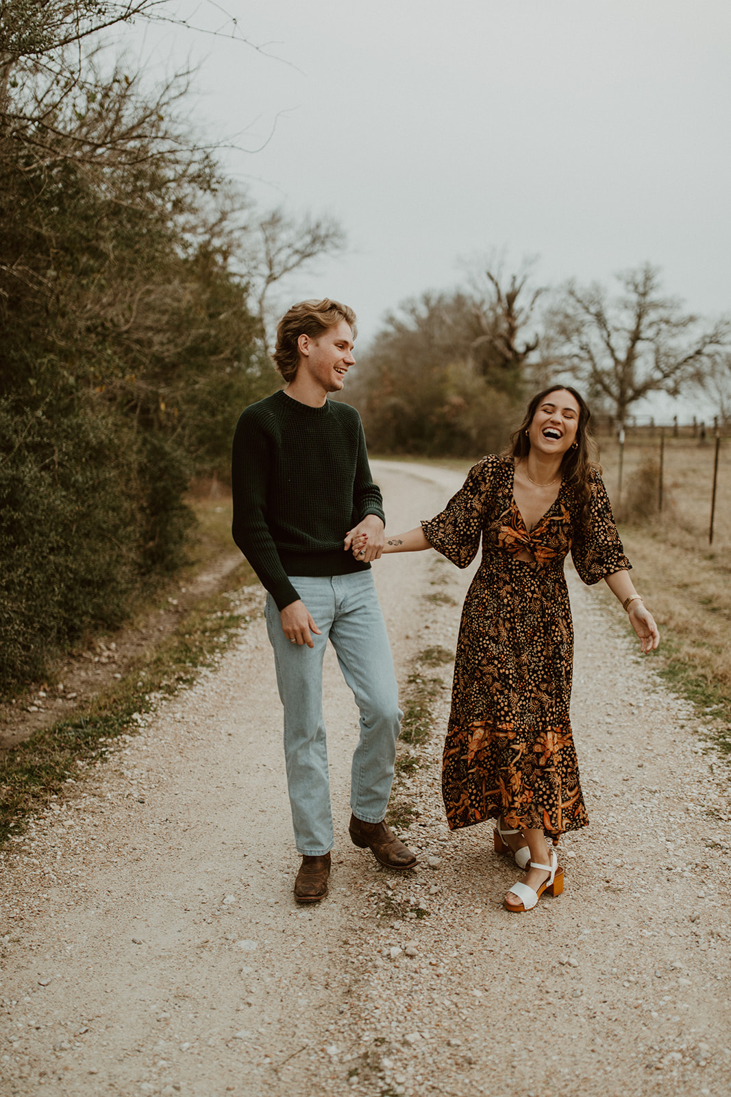 A couple's candid engagement session in College Station Texas by Sullivan Taylor