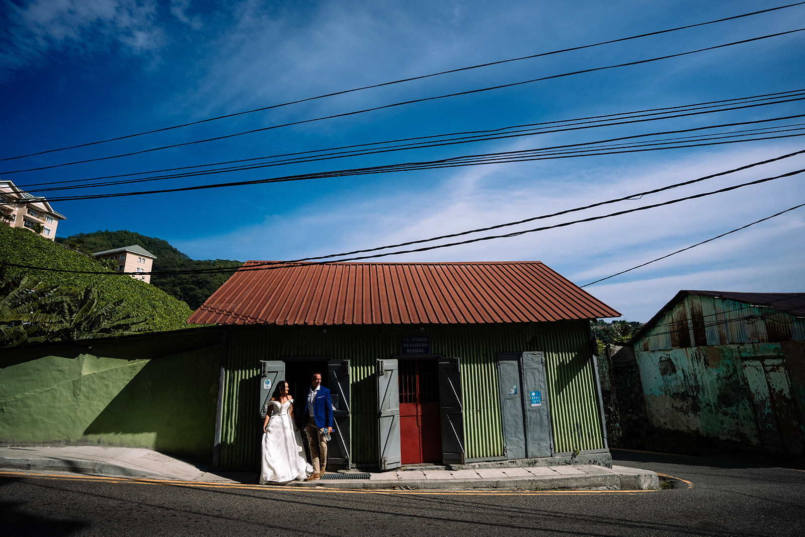Wedding Photoshoot in Victoria, Seychelles in-front of a rustic Creole building