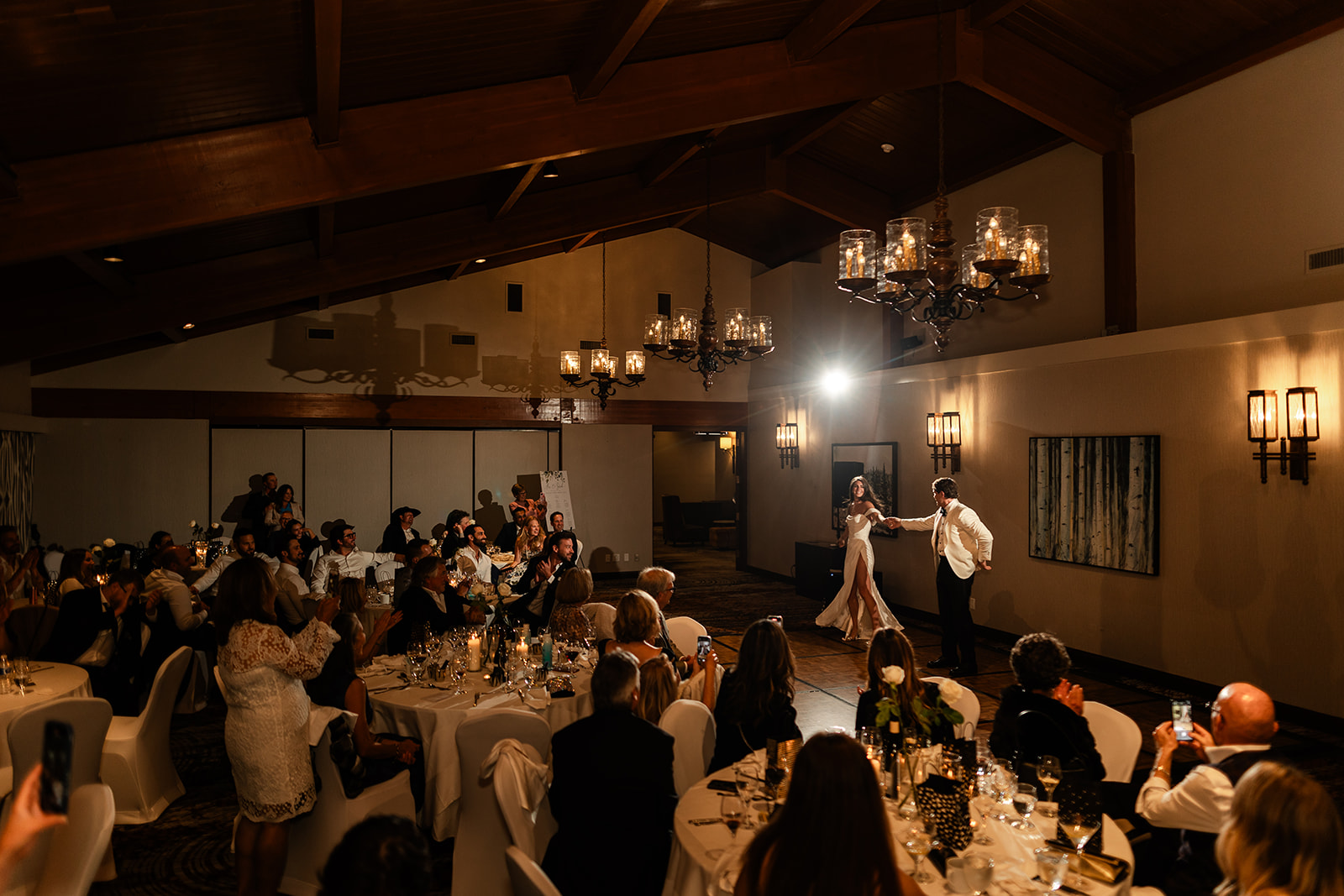 A couples first dance at their wedding at the Fairmont Jasper Park Lodge