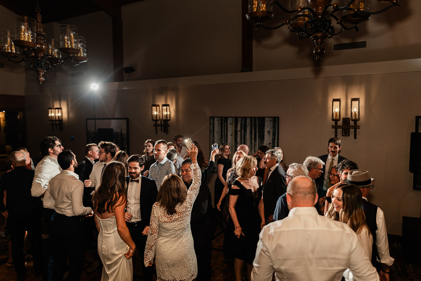 A lively dance floor at a wedding at the Fairmont Jasper Park Lodge