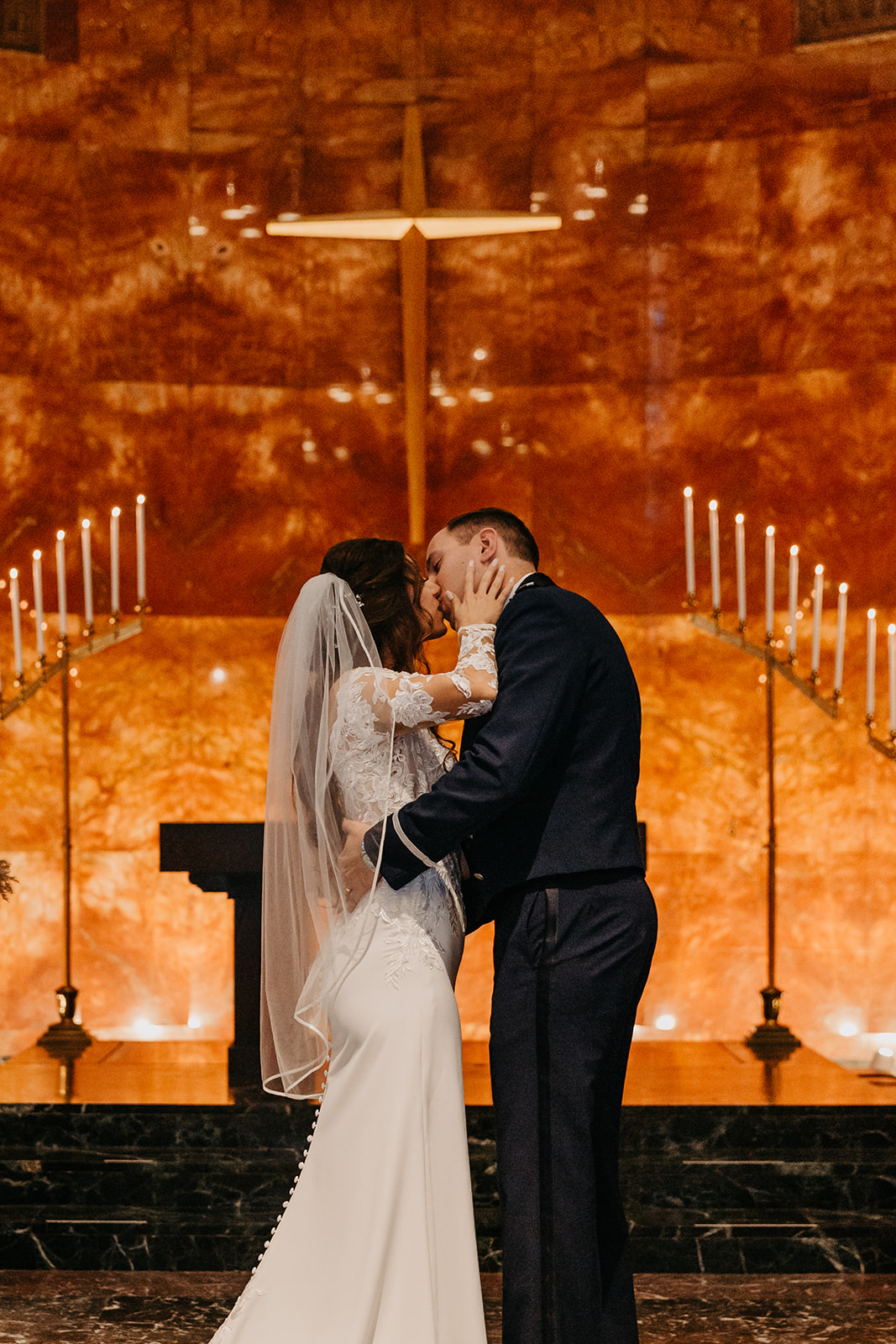 documentary candid religious church wedding ceremony first kiss at Northwestern Nazareth Chapel St.Paul Minnesota 