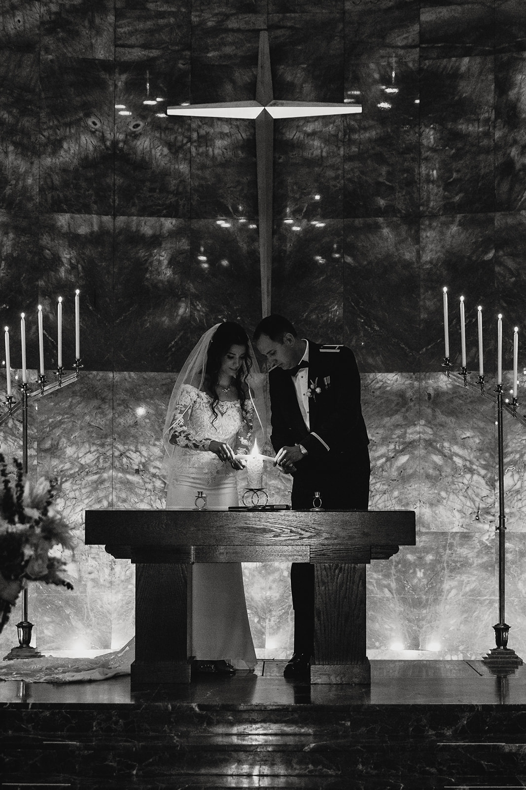 documentary candid religious church wedding ceremony unity candle at Northwestern Nazareth Chapel St.Paul Minnesota 