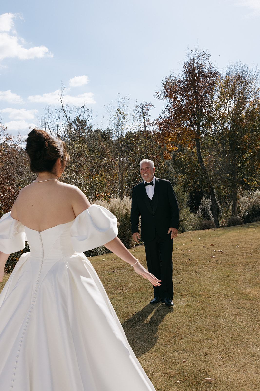 Daughter and dad have first look during wedding at The Barn at Smith Lake in Alabama