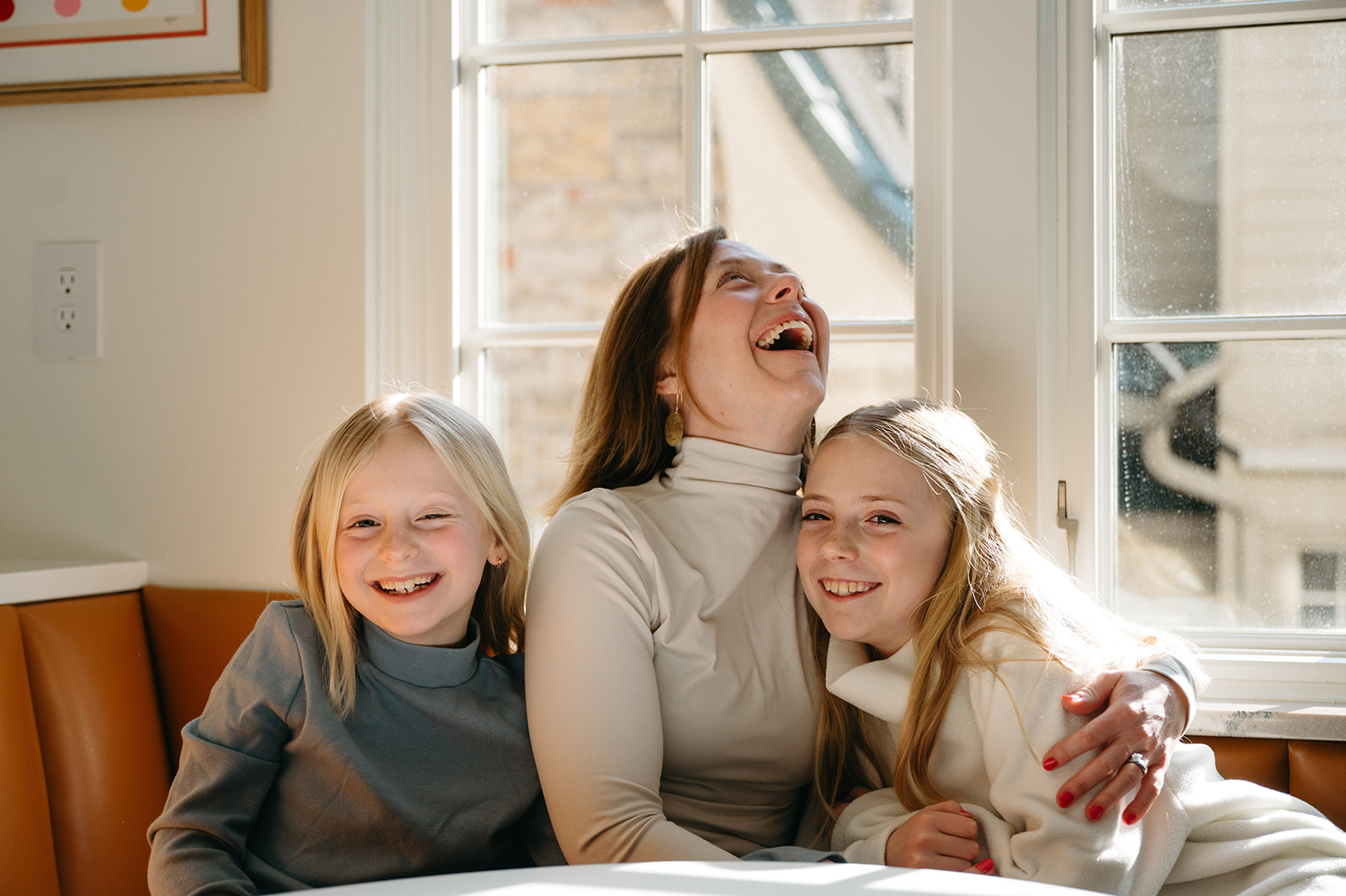 Momma and her girls laughing 