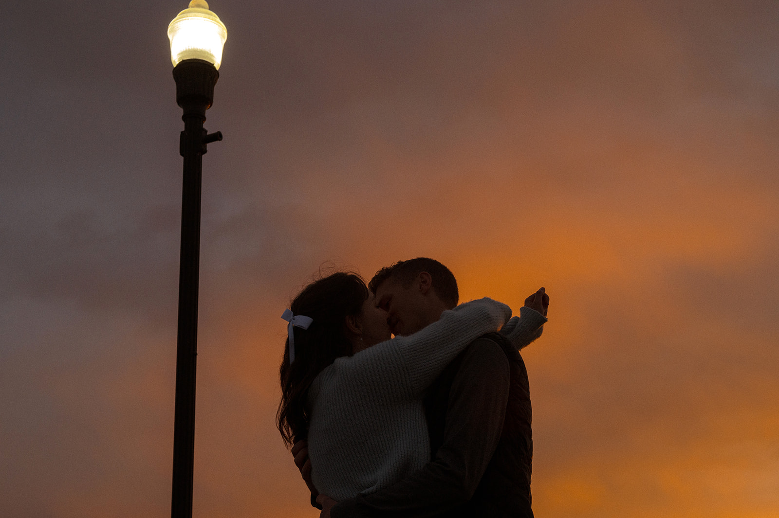 Utah Lake couples session ending with the most magical sunset