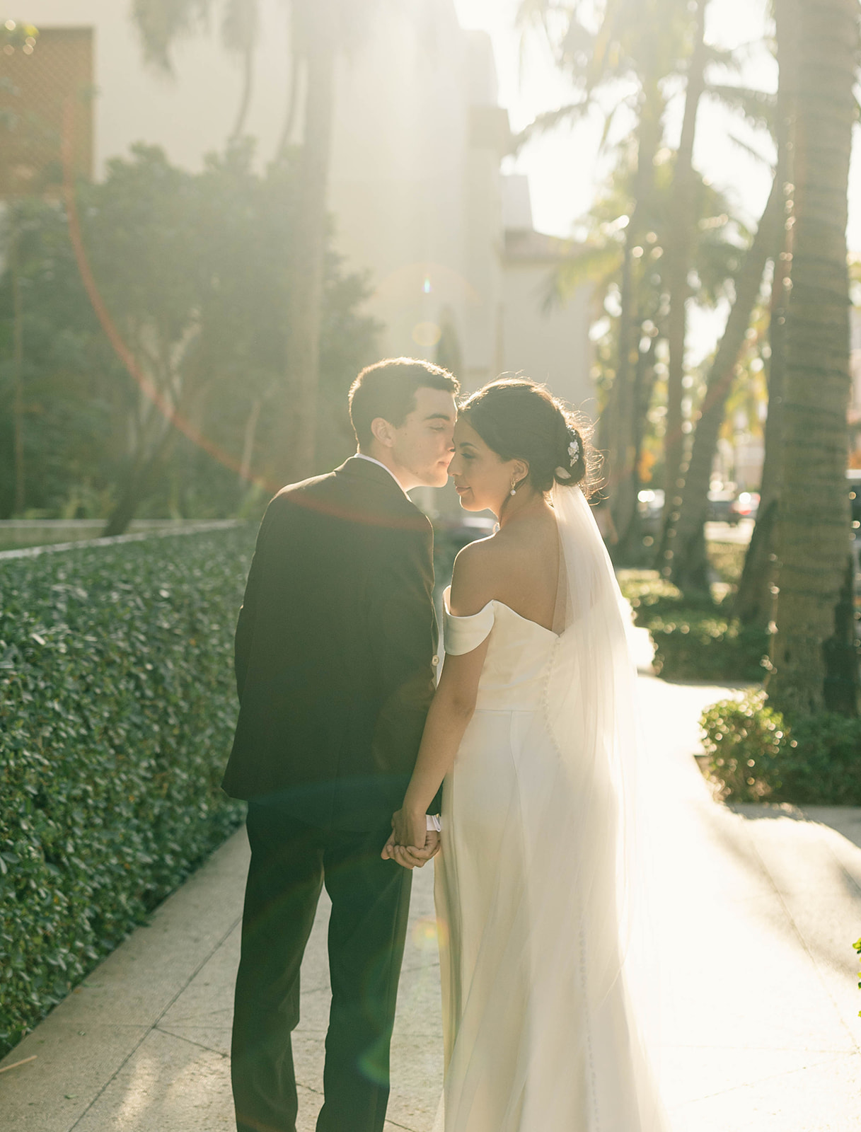Bride and Groom portraits on Worth Avenue on Palm Beach, Island at their intimate beach wedding