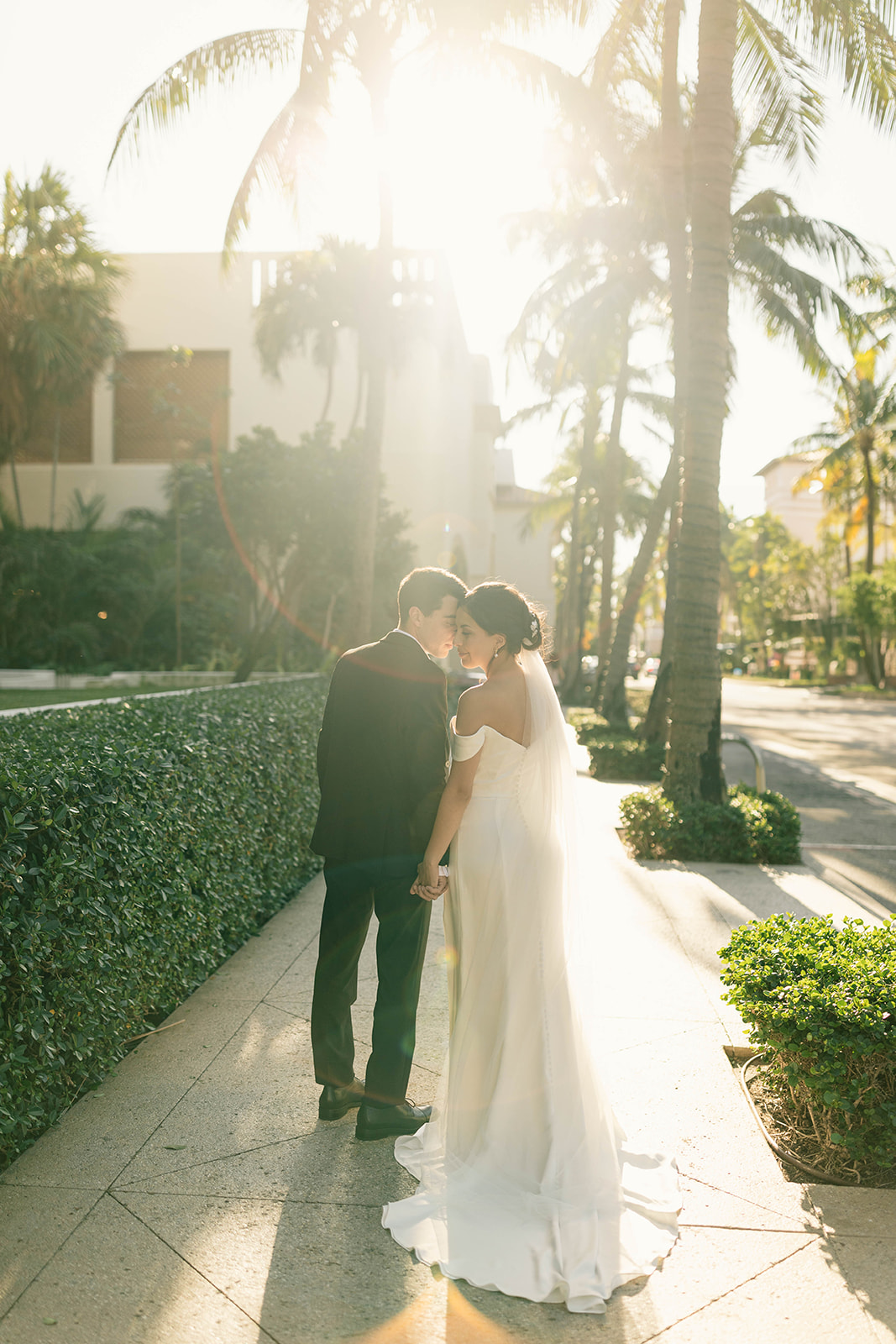 Bride and Groom portraits on Worth Avenue on Palm Beach, Island at their intimate beach wedding