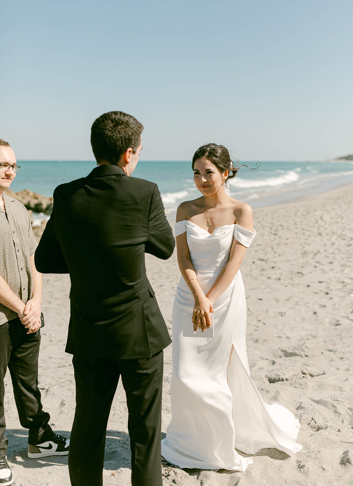 Bride and groom at their intimate beach ceremony in Palm Beach, Florida