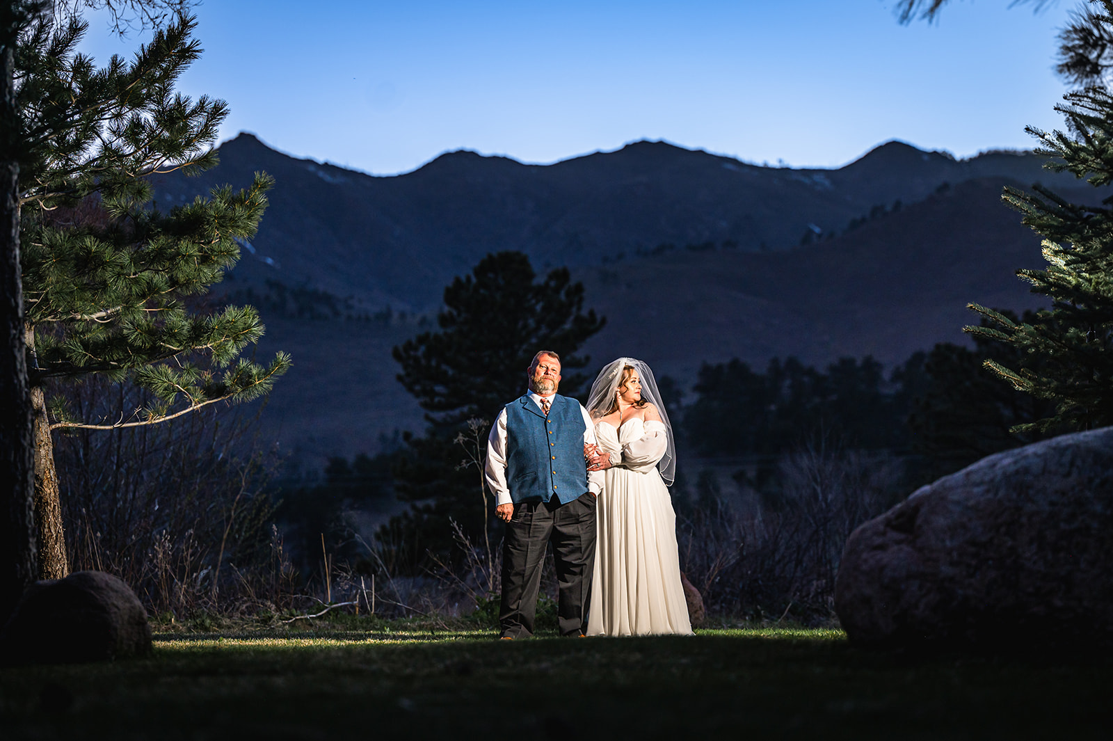 bride and groom grass rocks mountain blue hour wedding couple photography denver colorado 