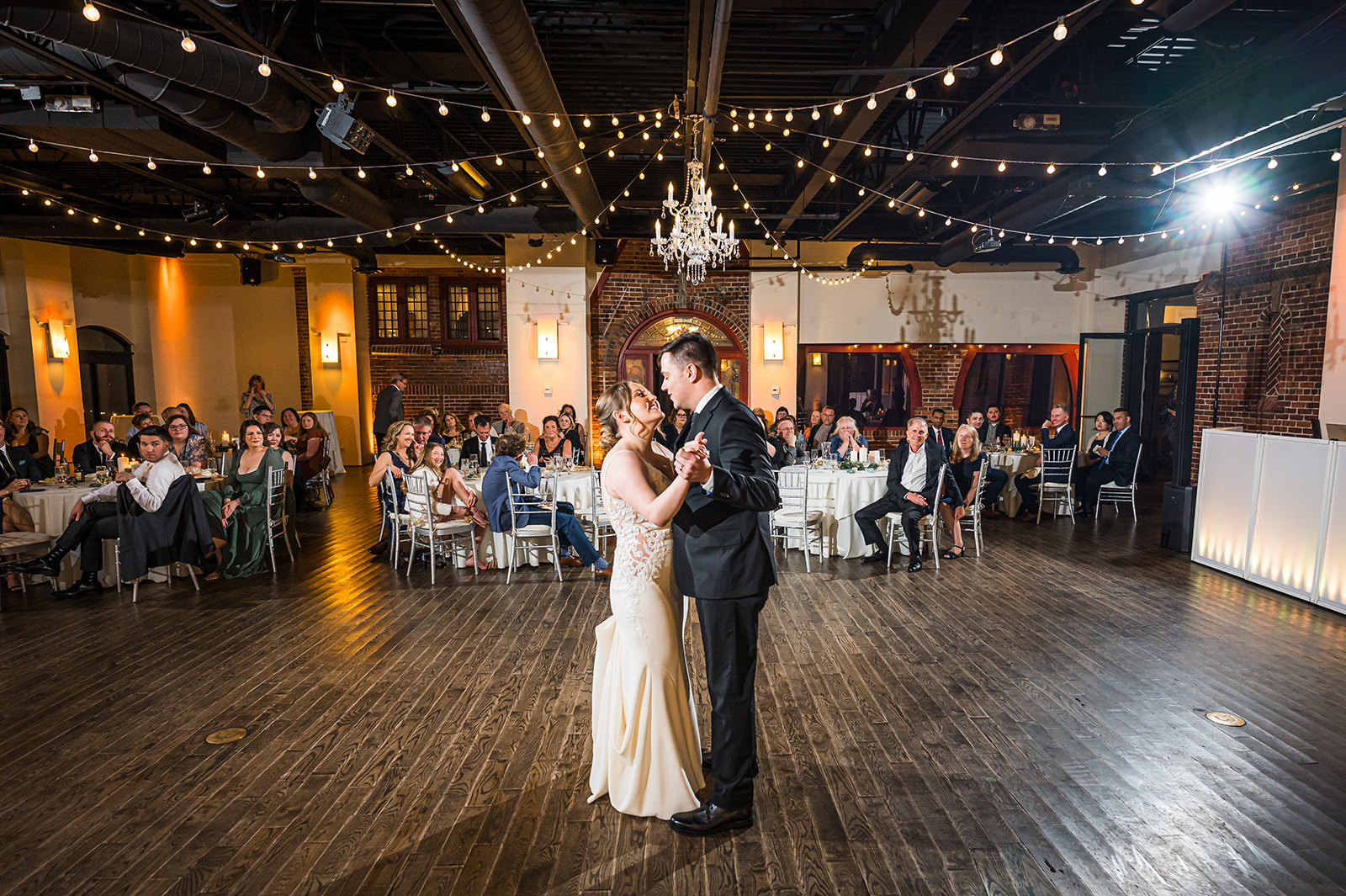 wellshire event center wedding first dance reception whole room tables guests chandelier fairy tale denver wedding photo